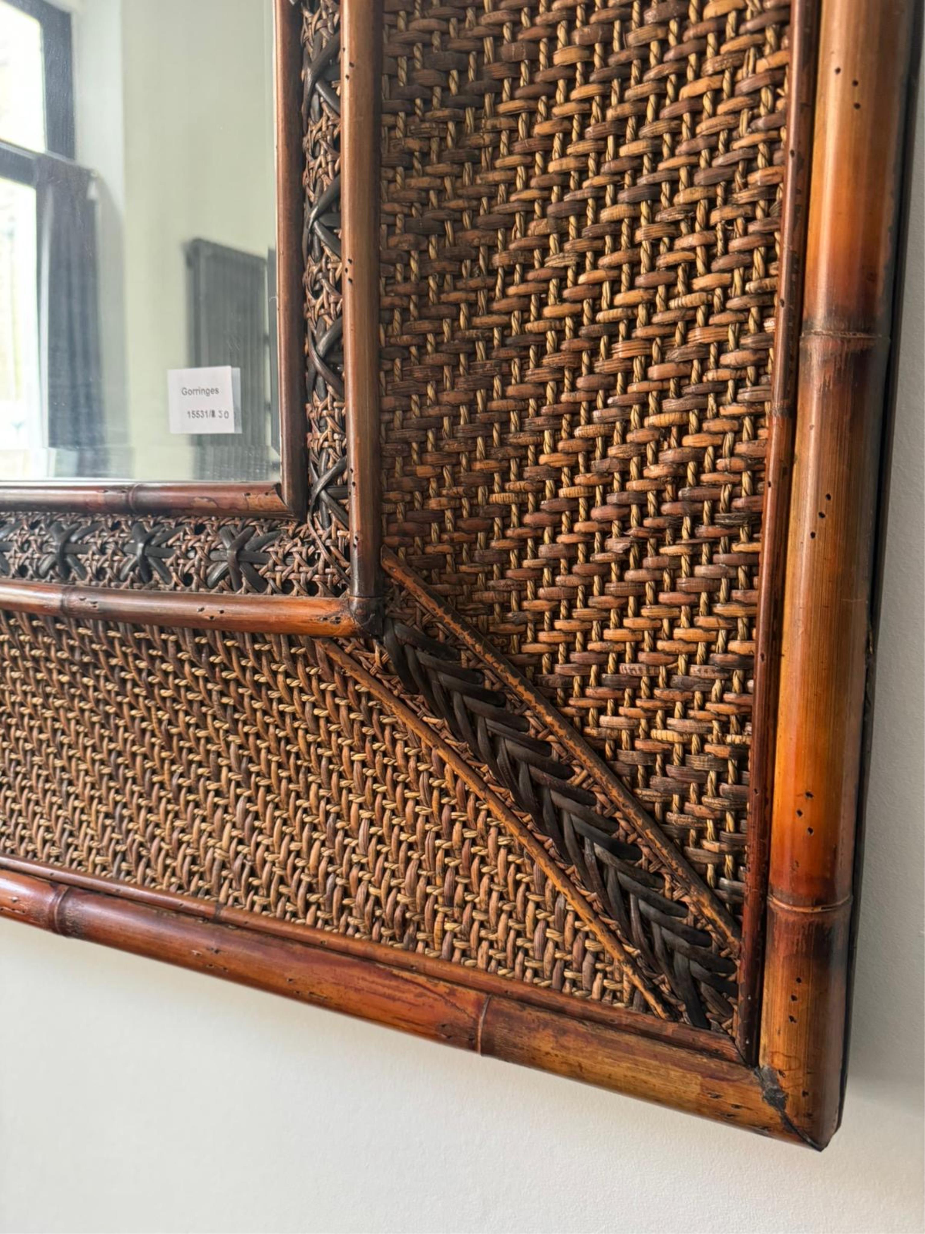 A large rectangular bamboo and rattan wall mirror, width 219cm, height 126cm. Condition - good